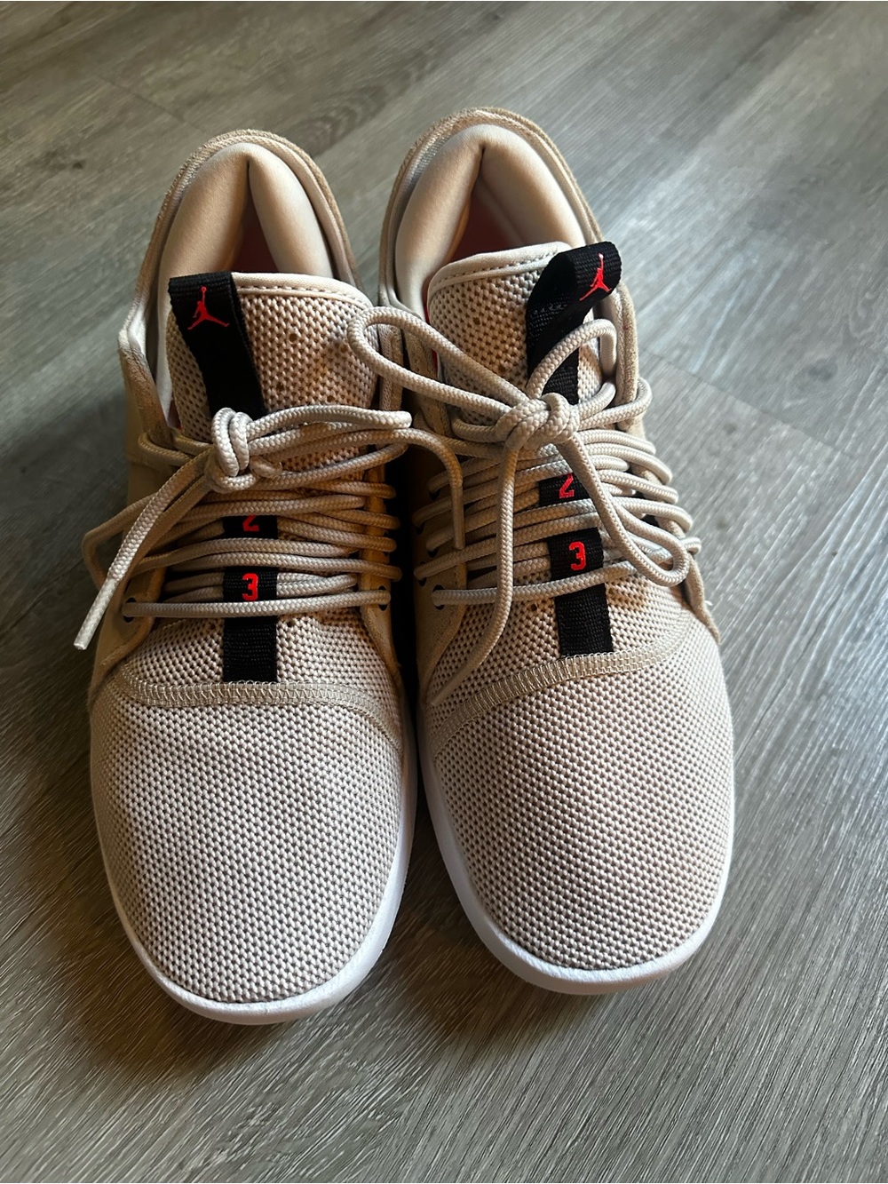 Jordan Knit Sneaker in Beige with Black & Red Accents Womens Size 7